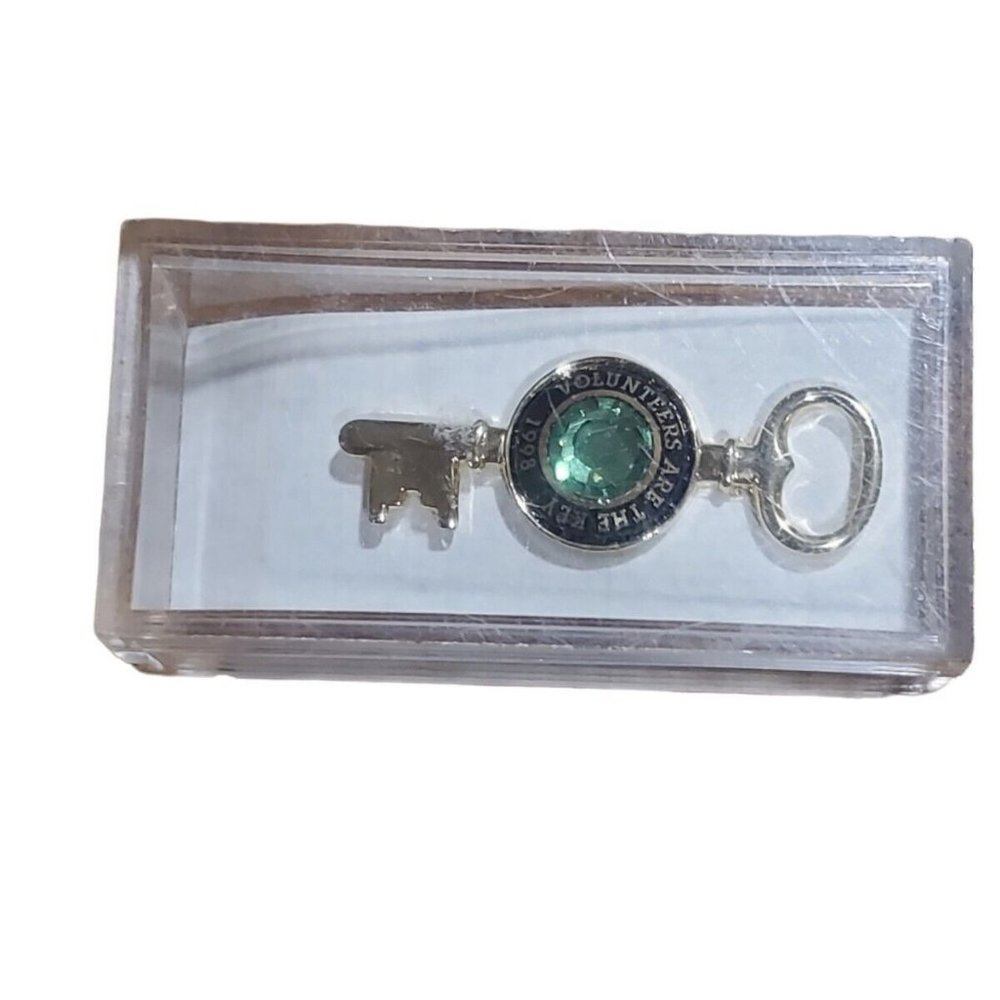 Vintage Award Pin For Volunteers Gold Tone Key with Green Crystal